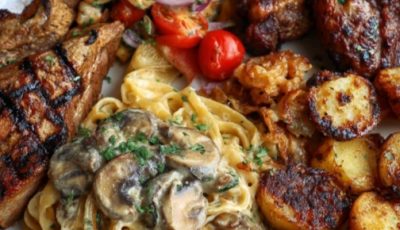 Grilled Steak and Chicken Platter with Creamy Mushroom Pasta and Veggies